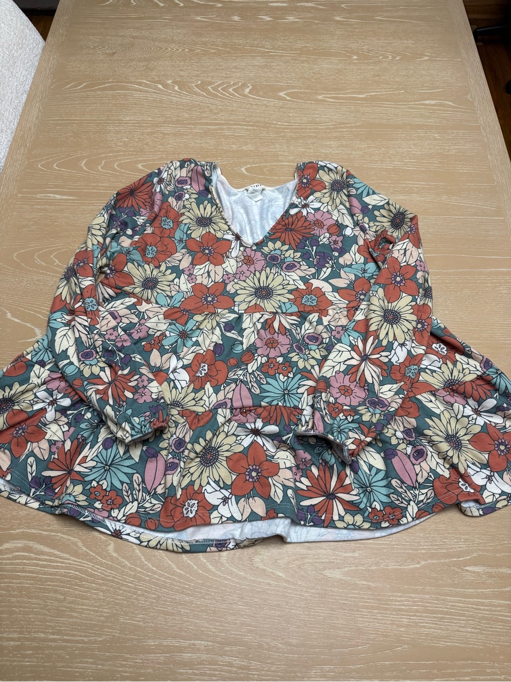 BiBi Floral V-Neck Long Sleeve Peplum Top in Coral, Teal, Cream